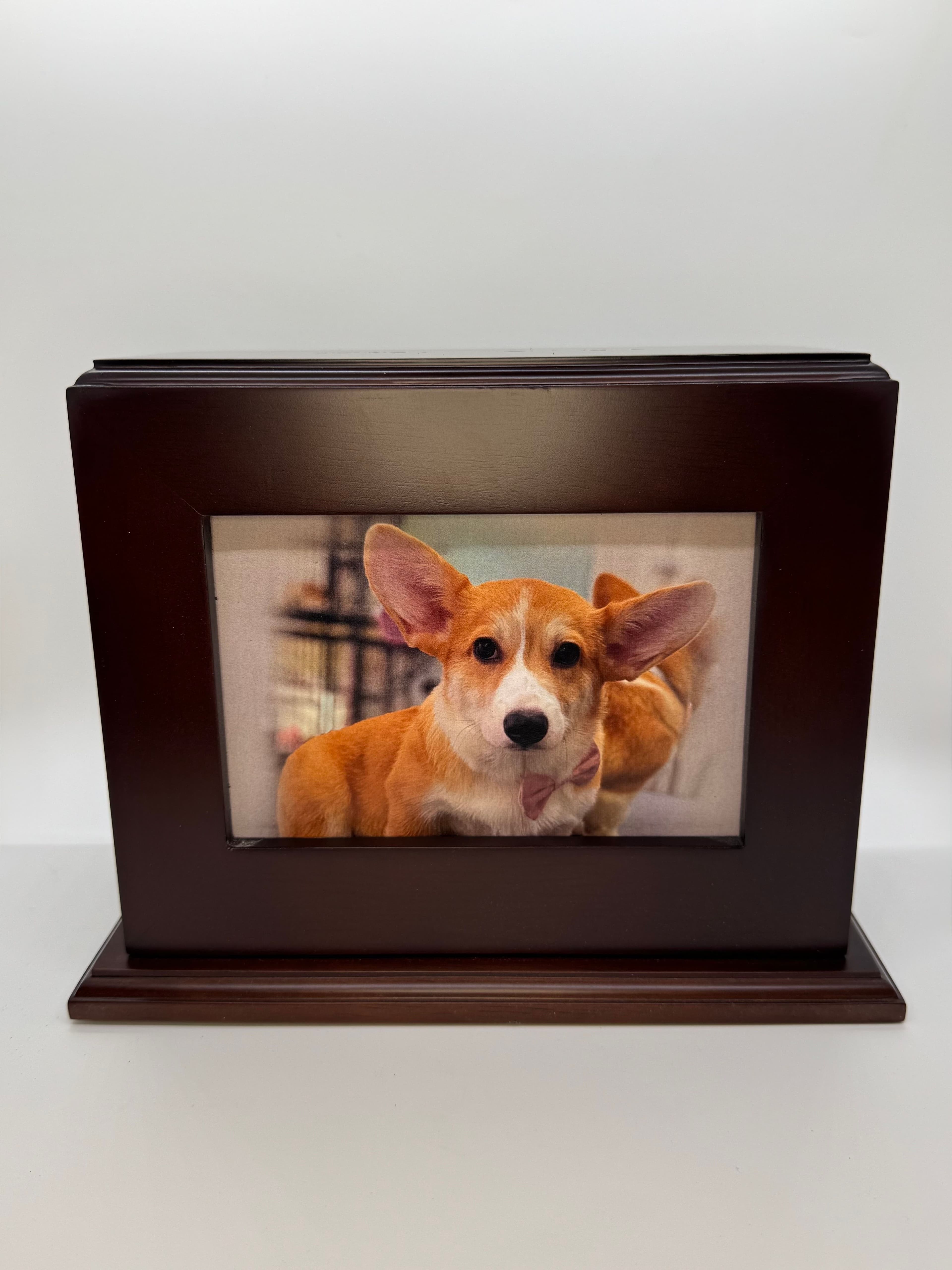 Walnut wood photo urn with frame window in landscape orientation.
